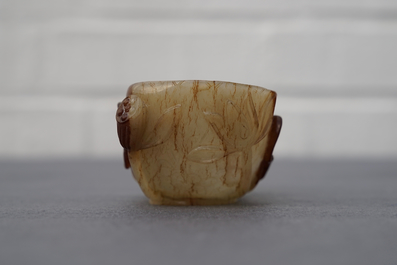 A Chinese lotus-shaped russet jade libation cup, 18/19th C.